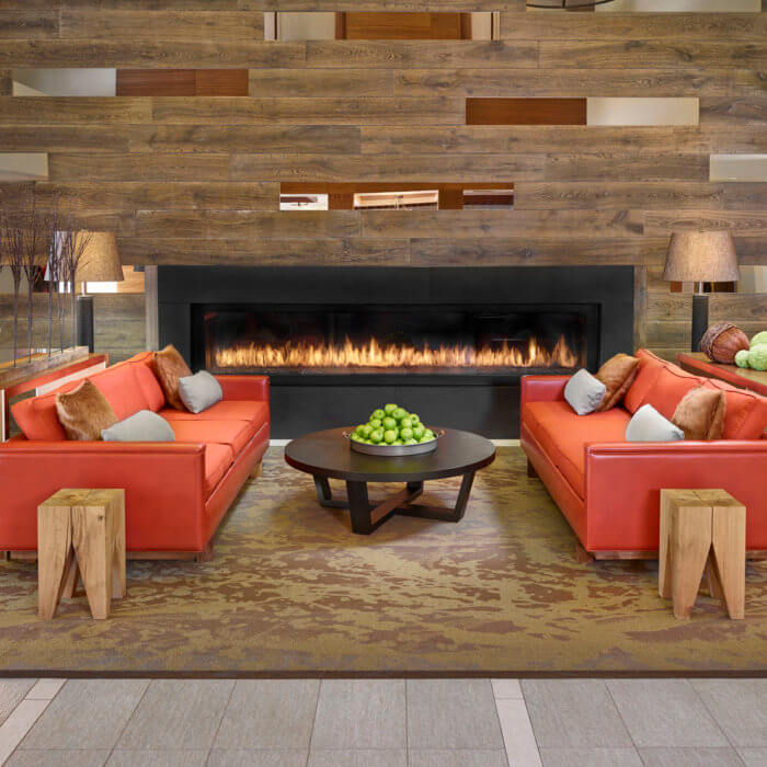 Best Western Hotel Interior Design Lobby Fireplace Orange Sofa
